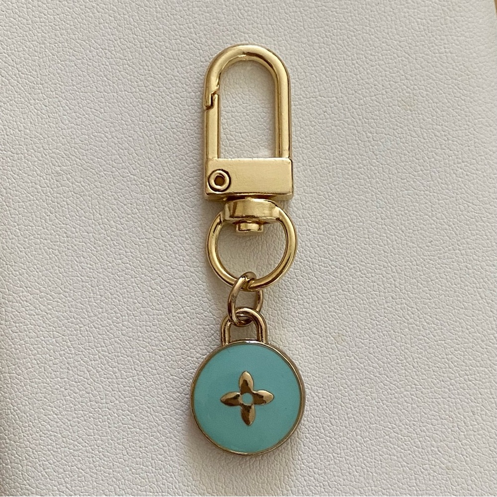 Authentic vintage teal Louis Vuitton charm